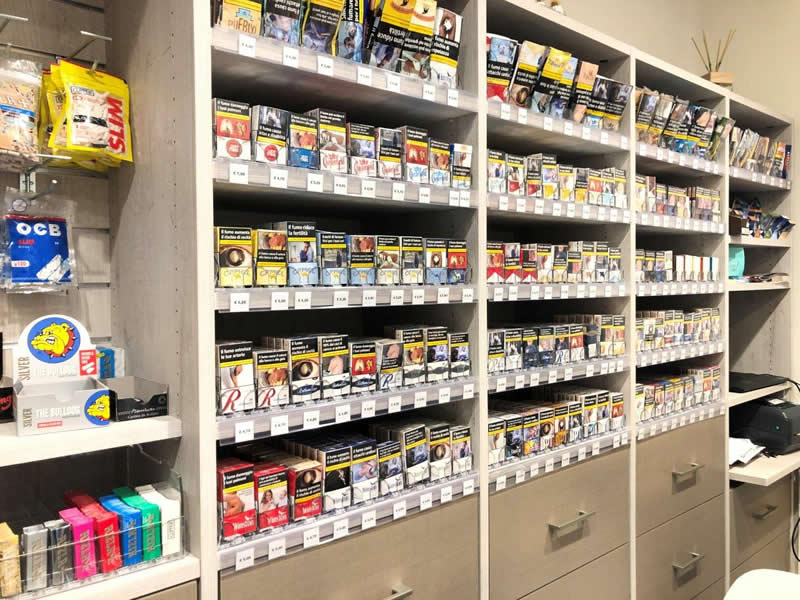 Espositore pacchetti di sigarette con molla spingi pacchetto per avanzamento prodotto Espositore pacchetti di sigarette con molla spingi pacchetto per avanzamento prodotto